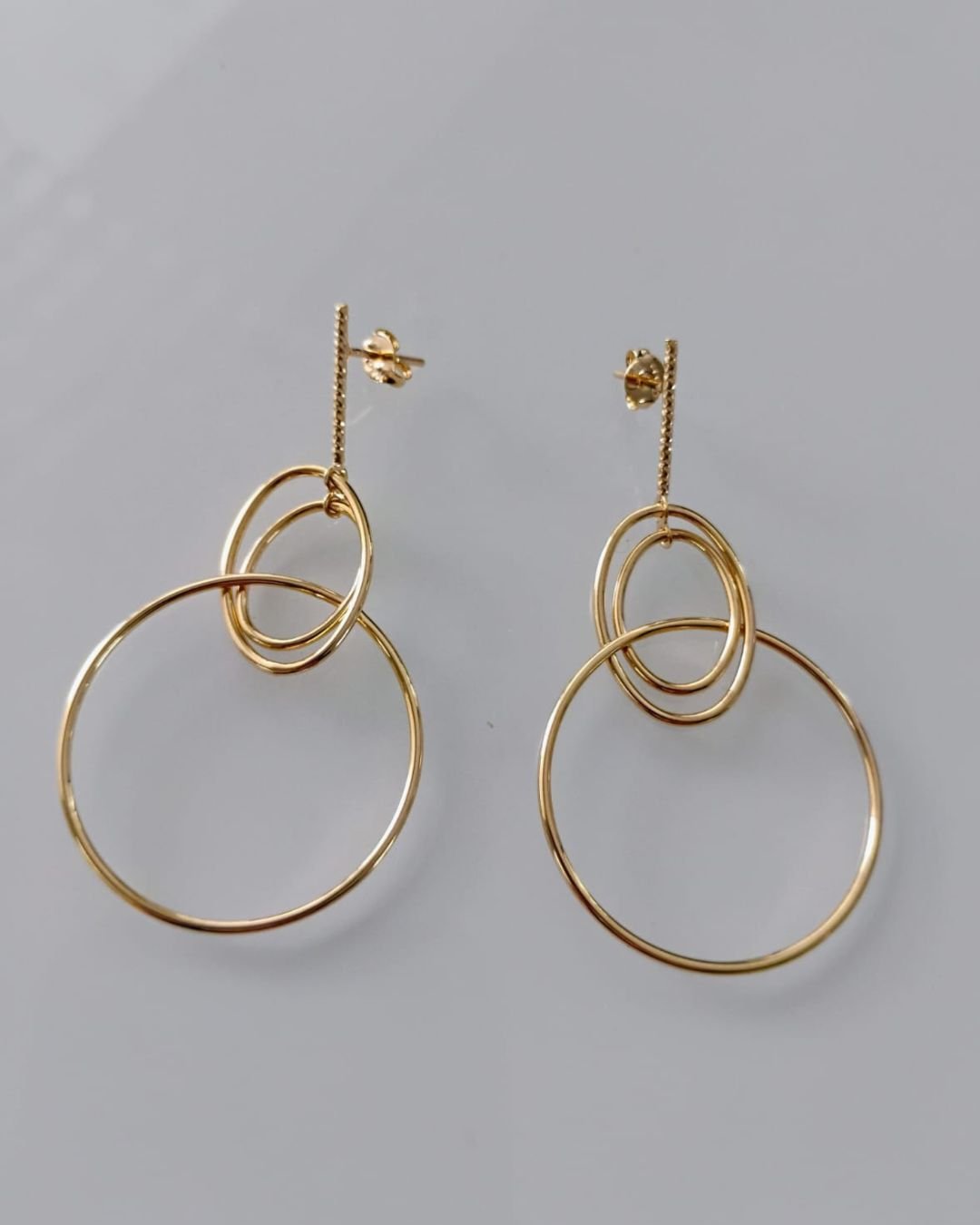 Brinco círculo pendurado